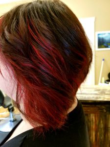 Great red highlights in client hair style